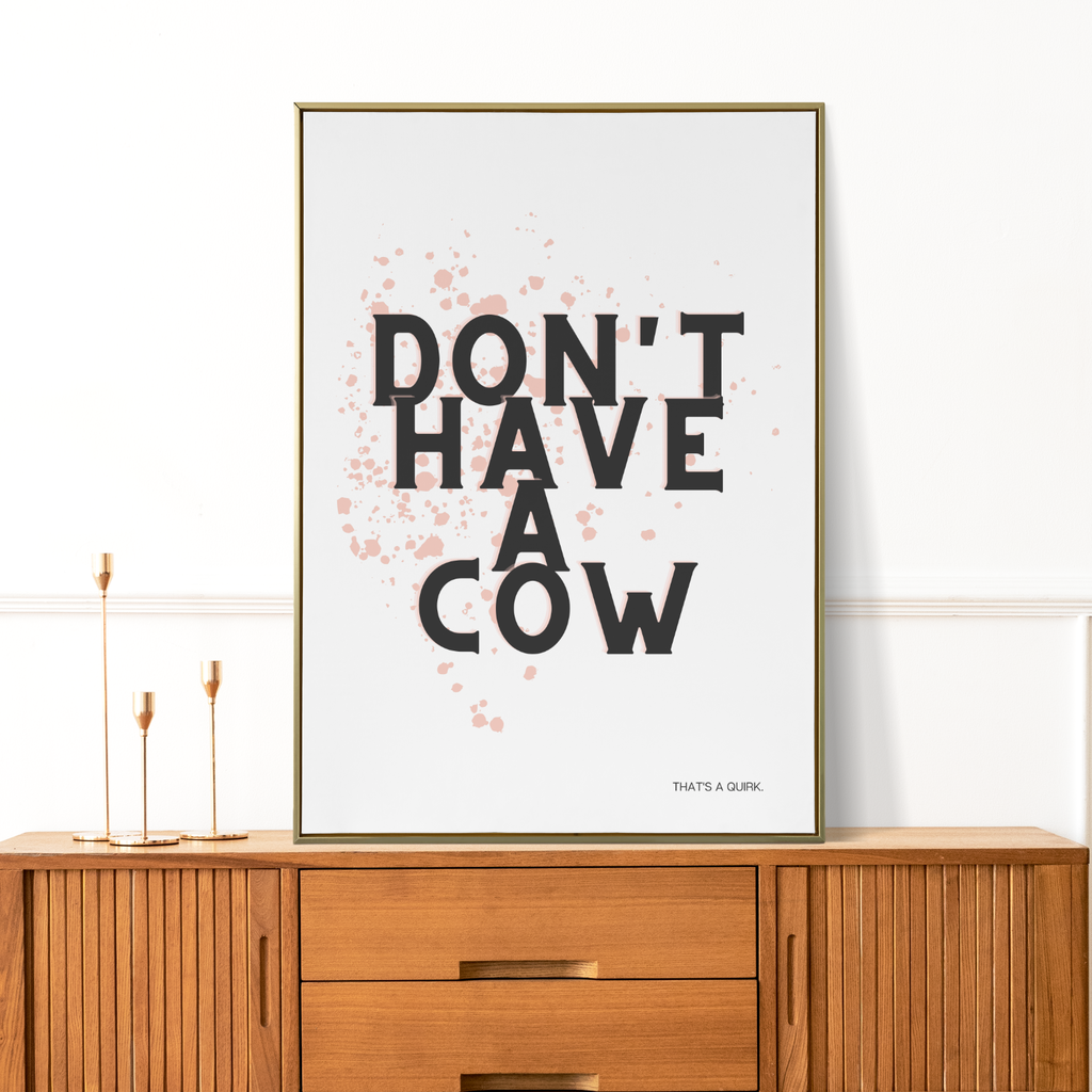 Don't have a cow art print: Black text with soft pink splotches.